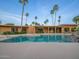 Backyard pool with diving board, desert landscaping, patio, and ample space for relaxation at 7816 N 47Th St, Paradise Valley, AZ 85253