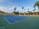 Tennis court surrounded by mountain views, palm trees, and desert landscaping, an outdoor enthusiast's dream at 7816 N 47Th St, Paradise Valley, AZ 85253