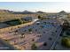 Spacious property with a large backyard featuring a pool and desert landscaping, blending luxury and natural beauty at 7969 S 172Nd St, Queen Creek, AZ 85142