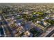 Wide shot of the neighborhood showcasing a home with a pool and meticulously landscaped yard, close to community amenities at 7969 S 172Nd St, Queen Creek, AZ 85142