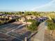 Wide aerial view of desert property with lush trees, unique cacti, and a long driveway at 7969 S 172Nd St, Queen Creek, AZ 85142