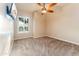 Bedroom with natural light, ceiling fan, and TV at 7969 S 172Nd St, Queen Creek, AZ 85142