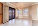 Formal dining room features modern chandelier, large windows and decorative french doors at 7969 S 172Nd St, Queen Creek, AZ 85142