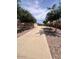 Long driveway leads to the home's spacious garage, offering ample parking and curb appeal at 7969 S 172Nd St, Queen Creek, AZ 85142