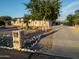 Attractive property features lovely landscaping, desert accents, and mature trees, enhancing curb appeal at 7969 S 172Nd St, Queen Creek, AZ 85142