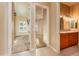 Hallway view to bedroom and bathroom with tiled floors and neutral paint at 7969 S 172Nd St, Queen Creek, AZ 85142