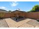Enjoy the backyard patio dining area perfect for relaxing or entertaining at 799 W Press Rd, San Tan Valley, AZ 85140
