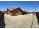 Backyard showing an open area surrounded by brick walls at 8609 S 16Th St, Phoenix, AZ 85042