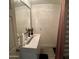 Modern bathroom with a sleek vanity, a large mirror, and minimalist decor at 8609 S 16Th St, Phoenix, AZ 85042