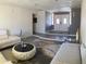 Bright living room showcasing modern furniture, neutral walls, and stylish flooring at 8609 S 16Th St, Phoenix, AZ 85042