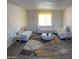 Spacious living room with recessed lighting, neutral walls and modern furnishings at 8609 S 16Th St, Phoenix, AZ 85042