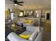 Bright, open concept living room and kitchen featuring recessed lighting and comfortable seating at 8609 S 16Th St, Phoenix, AZ 85042