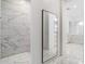 Spacious bathroom featuring a modern shower, full length mirror, and pristine white finishes at 9280 E Thompson Peak Pkwy # 39, Scottsdale, AZ 85255