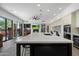 Open-concept kitchen featuring a large island, modern appliances, and a seamless transition to the living area at 9280 E Thompson Peak Pkwy # 39, Scottsdale, AZ 85255