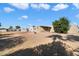 Spacious lot featuring desert landscaping, shade trees, and outdoor storage at 9347 E Edgewood Ave, Mesa, AZ 85208