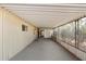 Spacious covered patio featuring concrete flooring and enclosed side at 9347 E Edgewood Ave, Mesa, AZ 85208