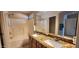Bathroom featuring dual sinks and a shower/tub combo at 14748 W Willow Ln, Surprise, AZ 85374