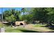 Community walking path with greenbelt featuring bridge and trees at 14748 W Willow Ln, Surprise, AZ 85374