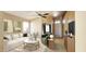 Inviting living room boasts stylish decor, comfortable seating, and an open entrance to the front door at 14748 W Willow Ln, Surprise, AZ 85374