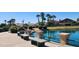 Lakeside view with benches and beautiful lush landscaping at 14748 W Willow Ln, Surprise, AZ 85374