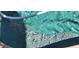 Close-up of a refreshing in-ground pool with clear water and a textured pool floor at 14748 W Willow Ln, Surprise, AZ 85374
