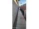 View of side yard with mature landscaping at 14748 W Willow Ln, Surprise, AZ 85374
