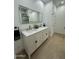 Bathroom featuring a double vanity at 15864 S Cherry Hills Dr, Arizona City, AZ 85123