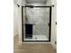 Modern shower with black hardware and marble-style tiling at 15864 S Cherry Hills Dr, Arizona City, AZ 85123