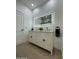 Bathroom featuring a double vanity and illuminated mirror at 15864 S Cherry Hills Dr, Arizona City, AZ 85123