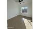 Tile floored bedroom featuring a window at 15864 S Cherry Hills Dr, Arizona City, AZ 85123