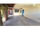 Covered courtyard area with a concrete floor, privacy, and easy access to multiple entryways at 1846 E Intrepid Ave, Mesa, AZ 85204