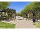 Community space with water feature, green landscaping, and shaded pergola at 20084 N 103Rd St, Scottsdale, AZ 85255