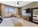 This bedroom features a large window, a desk, and a mirror, creating a functional and inviting space at 22849 E Marsh Rd, Queen Creek, AZ 85142
