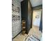 Hallway features stylish decor, designer-selected accent wall, and easy access to adjacent rooms at 22849 E Marsh Rd, Queen Creek, AZ 85142