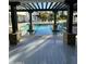 Tranquil view of the backyard pool and pergola creates a relaxing outdoor retreat at 2311 E Colter St, Phoenix, AZ 85016
