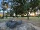 Inviting outdoor fire pit area with comfortable seating, perfect for relaxing evenings at 2311 E Colter St, Phoenix, AZ 85016