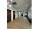 Large gym area with exercise equipment and a view of the living room at 2311 E Colter St, Phoenix, AZ 85016
