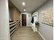 Hallway with built in storage and a mud room bench at 2311 E Colter St, Phoenix, AZ 85016