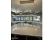Stylish kitchen with large central island, quartz countertops, and modern pendant lighting at 2311 E Colter St, Phoenix, AZ 85016