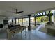Spacious outdoor living area with games, a full kitchen, and a luxurious pool view at 2311 E Colter St, Phoenix, AZ 85016