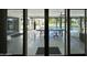 Large patio with dual ping pong tables, a pool, and an outdoor seating area at 2311 E Colter St, Phoenix, AZ 85016