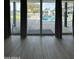 View from inside showcases the outdoor pool and backyard, offering a glimpse of resort-style living at 2311 E Colter St, Phoenix, AZ 85016