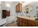 Functional bathroom with a vanity, sink, and a large mirror at 4501 E Carol Ave # 48, Mesa, AZ 85206