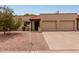 Charming single-story home with a two-car garage and well-maintained landscaping at 4501 E Carol Ave # 48, Mesa, AZ 85206
