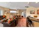 Stylish living room open floor plan with bar seating, tile floors, and ample seating at 6088 E Knolls N Way, Cave Creek, AZ 85331