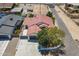 Aerial view of a well-maintained property featuring a red tile roof and private backyard at 2701 E Caldwell St, Phoenix, AZ 85042