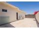 Side of the house shows the exterior with access door and gate at 2701 E Caldwell St, Phoenix, AZ 85042