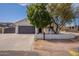 Charming home featuring a well-maintained front yard and a spacious two-car garage, perfect for suburban living at 2701 E Caldwell St, Phoenix, AZ 85042