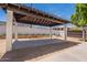 Outdoor patio featuring a shaded pergola area, ideal for relaxation and enjoyment at 2701 E Caldwell St, Phoenix, AZ 85042