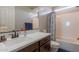 Bathroom featuring a tub shower, vanity, and updated fixtures at 3871 E Harrison St, Gilbert, AZ 85295